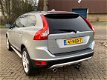 Volvo XC60 - 2.4 D5 AWD 185 pk AUTOM. Momentum TREKHAAK I NAVI + CAMERA I VOL LEER - 1 - Thumbnail