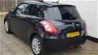 Suzuki Swift - 1.2 5drs exclusive clima cruise zeer mooi - 1 - Thumbnail