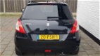 Suzuki Swift - 1.2 5drs exclusive clima cruise zeer mooi - 1 - Thumbnail