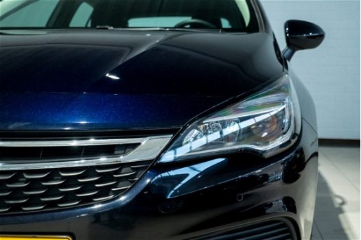 Opel Astra - 1.4 Turbo Online Edition | Navigatie | Airco | Cruise Control | Parkeersensoren | Licht - 1