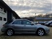 Subaru Impreza Plus - 1.5R Comfort Nieuwe APK Airco, climate, dakraam en cruise control - 1 - Thumbnail