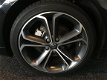 Opel Astra Sports Tourer - 1.6 Turbo Cosmo met Navigatie en Xenon - 1 - Thumbnail