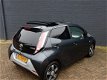 Toyota Aygo - 1.0 VVT-i x-clusiv NAVI OPEN DAK CAMERA ACHTER BLUETOOTH 5-DEURS ALLE OPTIES - 1 - Thumbnail