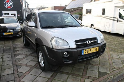 Hyundai Tucson - 2.0i 4WD Style Clima Cruise Trekhaak 141 pk NAP aanwezig - 1