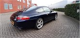 Porsche 911 - 3.6 Coupé Carrera 4 NL-auto 320pk Tiptronic 996 Facelift Revisiemotor Navi Xenon Topco - 1 - Thumbnail