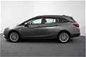 Opel Astra Sports Tourer - 1.4 Turbo (Navigatie/Blue tooth/Cruise control/LMV/PDC V+A) - 1 - Thumbnail