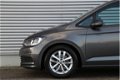 Volkswagen Touran - 1.2 TSI 110 Comfortline 7persoons Navigatie Trekhaak 76 - 1 - Thumbnail