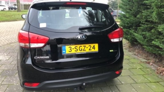 Kia Carens - 1.6 First Edition 7 persoons | Navigatie | Lage KM stand - 1