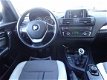 BMW 1-serie - 118i 5DRS URBAN 170PK HALF-LEER AIRCO PDC LMV - 1 - Thumbnail