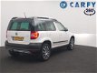 Skoda Yeti - 1.4 TSI 122pk Ambition trekhaak, xenon, panoramadak, parkeersensoren, dealer onderhoude - 1 - Thumbnail