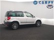 Skoda Yeti - 1.4 TSI 122pk Ambition trekhaak, xenon, panoramadak, parkeersensoren, dealer onderhoude - 1 - Thumbnail