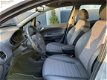 Opel Corsa - 1.4-16V Cosmo radio cd-speler, airco, cruise control, lichtmetaal - 1 - Thumbnail