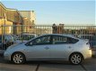 Toyota Prius - 1.5 VVT-i Business Edition LEER/ KEYLESS/ JBL - 1 - Thumbnail