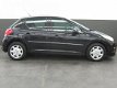 Peugeot 207 - 1.4 benzine * Airco * Trekhaak * Bluetooth * Cruise Control * Vingerhoets bladel: 995+ - 1 - Thumbnail