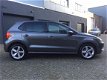 Volkswagen Polo - 1.4 TDI Comfortline Clima Cruise Navi Pano PDC LM-Wielen APK NAP - 1 - Thumbnail