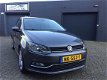 Volkswagen Polo - 1.4 TDI Comfortline Clima Cruise Navi Pano PDC LM-Wielen APK NAP - 1 - Thumbnail