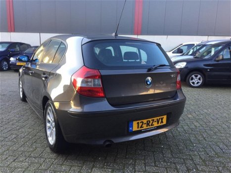 BMW 1-serie - 120i High Executive Aut. Clima Cruise LM-Wielen PDC APK NAP - 1