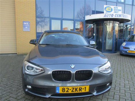 BMW 1-serie - 114i Business+ Leder/PDC/Navi/sportbak - 1