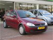 Opel Corsa - 1.0-12V Comfort 1e Eigenaar/Nw Apk/Elec ramen/Lage km stand - 1 - Thumbnail