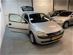 Opel Corsa - 1.4-16V Comfort AUTOMAAT//ELEC RAMEN//RIJD SCHAKELD TOP - 1 - Thumbnail