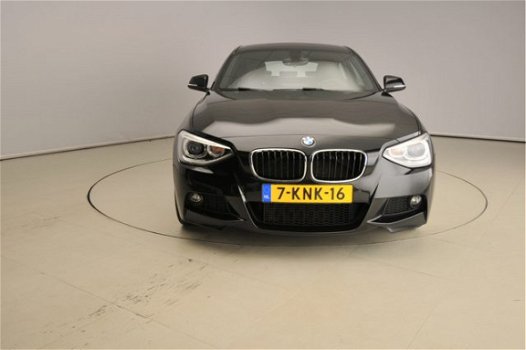 BMW 1-serie - 125I M-sportpakket / Xenon / Leder / Navigatie / Sportstoelen / Elektr. zetels / Shado - 1