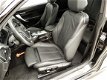 BMW 1-serie - 125I M-sportpakket / Xenon / Leder / Navigatie / Sportstoelen / Elektr. zetels / Shado - 1 - Thumbnail