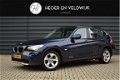 BMW X1 - sDrive20i Business | Trekhaak | PDC | Navi - 1 - Thumbnail
