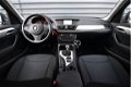 BMW X1 - sDrive20i Business | Trekhaak | PDC | Navi - 1 - Thumbnail
