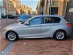 BMW 1-serie - 116d M PAKKET | AUTOMAAT | CAMERA | DEALER ONDR - 1 - Thumbnail