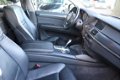 BMW X6 - xDrive 30d Navigatie Head Up display Massagestoelen Leer - 1 - Thumbnail