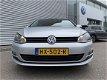 Volkswagen Golf - 1.6 TDI 110PK Highline | Camera | Navi | PDC | Massage - 1 - Thumbnail