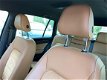 Volkswagen Golf Sportsvan - 1.2 TSI 110PK Highline DSG | Leder | Navi | Cruise | Stoelverw - 1 - Thumbnail