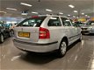 Skoda Octavia Combi - 1.6 Ambiente * 1e Eig / Airco / Cruise control - 1 - Thumbnail