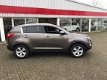 Kia Sportage - 2.0 X-ecutive Plus - 1 - Thumbnail