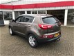 Kia Sportage - 2.0 X-ecutive Plus - 1 - Thumbnail