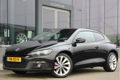 Volkswagen Scirocco - 1.4 TSI Highline Plus | 150PK - 1 - Thumbnail