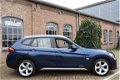BMW X1 - XDrive28i Business 4wd 245pk 2011 109.763 km Automaat Navi Leder - 1 - Thumbnail