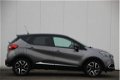 Renault Captur - TCe 90pk Dynamique | Navi | Clima | 17inch velgen | Two-tone | 36.000km - 1 - Thumbnail