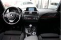 BMW 1-serie - 114i EDE Executive | Navigatie | Cruise control | Climate control | Parkeersensoren | - 1 - Thumbnail