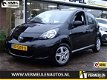 Toyota Aygo - 1.0 VVT-i 5D Now Airco/ LM-velgen/ Elect.pakket/ NL auto - 1 - Thumbnail