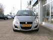 Suzuki Splash - 1.0 65pk 5D Comfort I Airco I Hoge instap I 1e eigenaar - 1 - Thumbnail