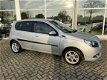 Chevrolet Aveo - 1.2 16V 84pk 5D LS+ Sport, Achterspoiler, Donker glas, Lm velgen - 1 - Thumbnail