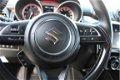 Suzuki Swift - 1.2 Stijl Smart Hybrid / Climate / Cruise / Navigatie - 1 - Thumbnail