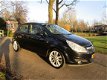 Opel Corsa - 1.2-16V Cosmo 5 deurs.airco.cruise control.electr.ramen.parkeer sensor.lm.wielen - 1 - Thumbnail