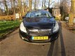 Opel Corsa - 1.2-16V Cosmo 5 deurs.airco.cruise control.electr.ramen.parkeer sensor.lm.wielen - 1 - Thumbnail