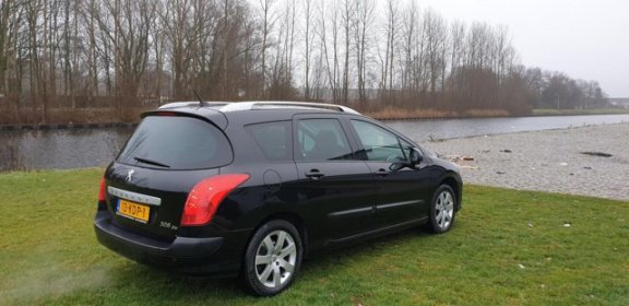 Peugeot 308 SW - 1.6 VTi XS Automaat super mooi auto navigatie leerbekeleding panoroma dak Parkeer s - 1