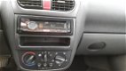 Opel Corsa - 1.4-16V Elegance Automaat - 1 - Thumbnail