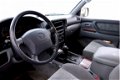 Toyota Land Cruiser 100 - Airco, 204 PK - 1 - Thumbnail