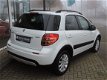 Suzuki SX4 - 1.6 Style - Nav | Climat | Stoelverw. | 4 seiz. banden - 1 - Thumbnail