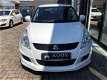 Suzuki Swift - 1.2 Exclusive EASSS X-ITE 6/12 M Garantie - 1 - Thumbnail